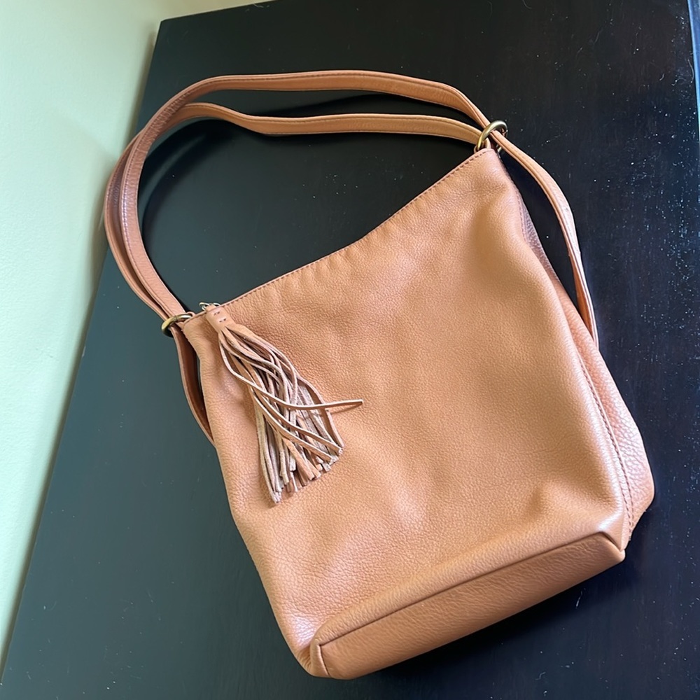 HOBO Convertible blaze shoulder bag and mini backpack in pebbled leather.